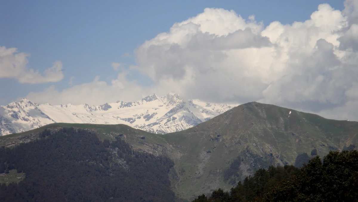 Snow ranges seen from Jalori Pass under cloud