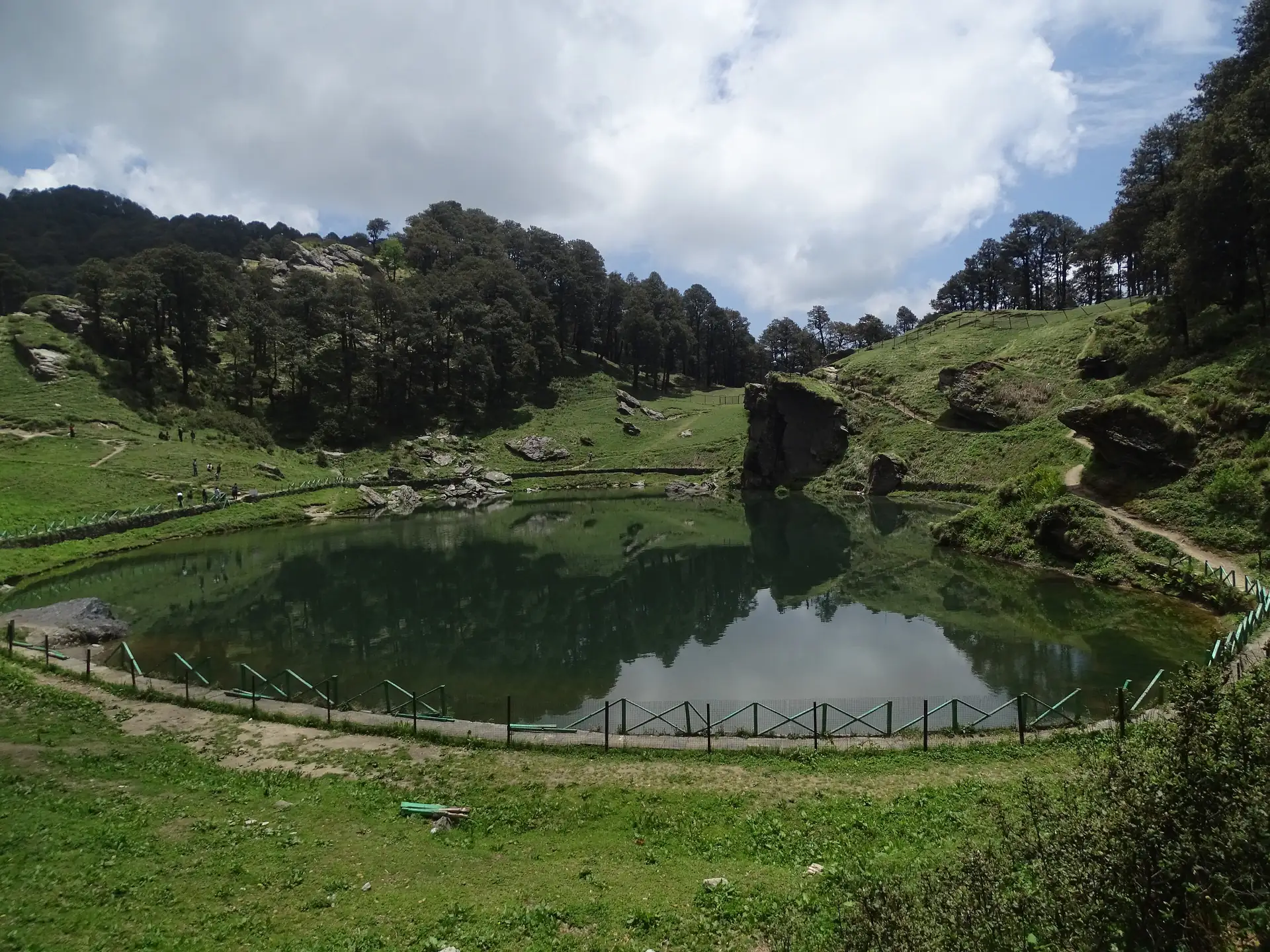 Serolsar lake ringed by forest