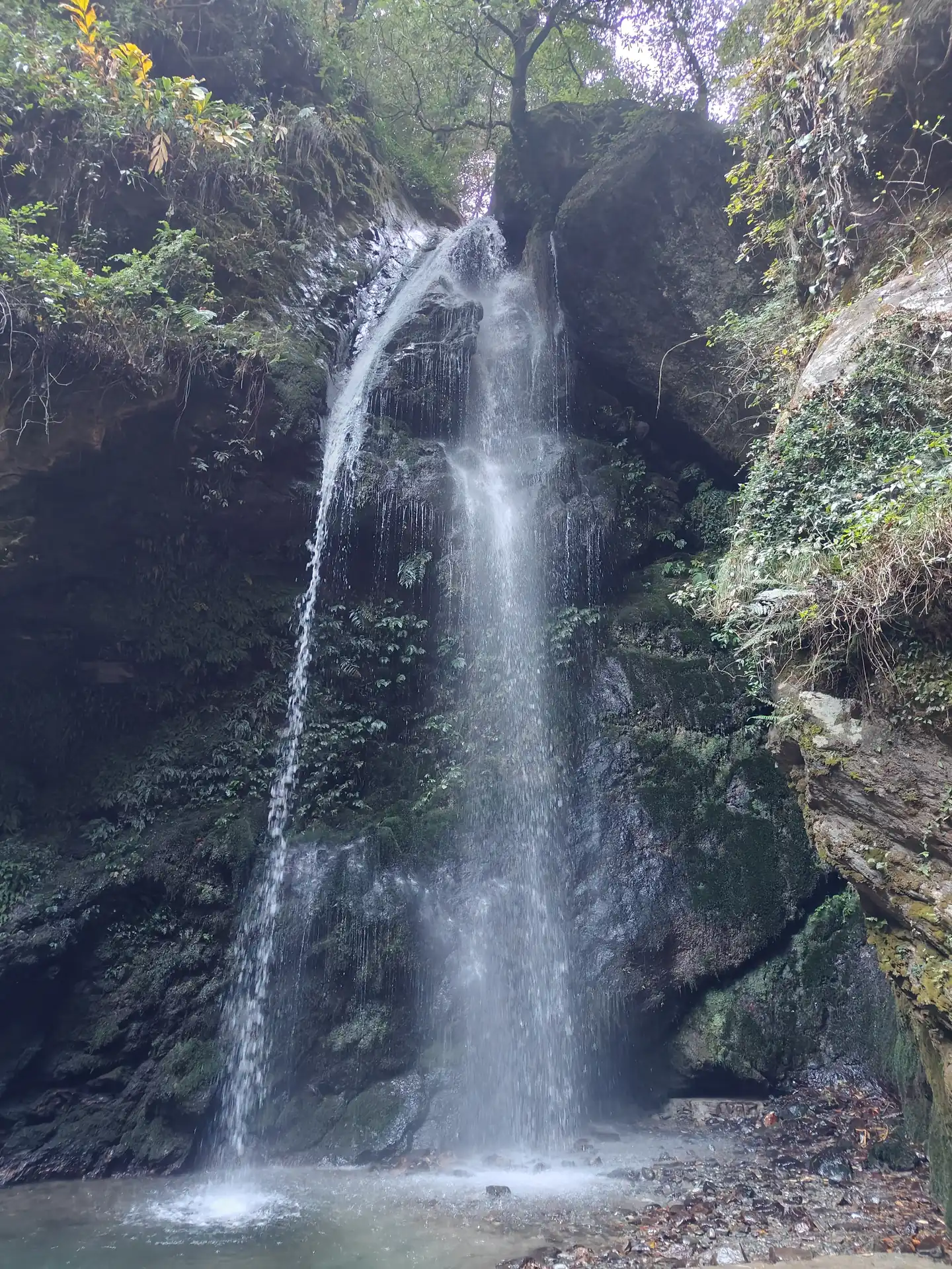 The waterfall at Jibhi dropping into a rock pool