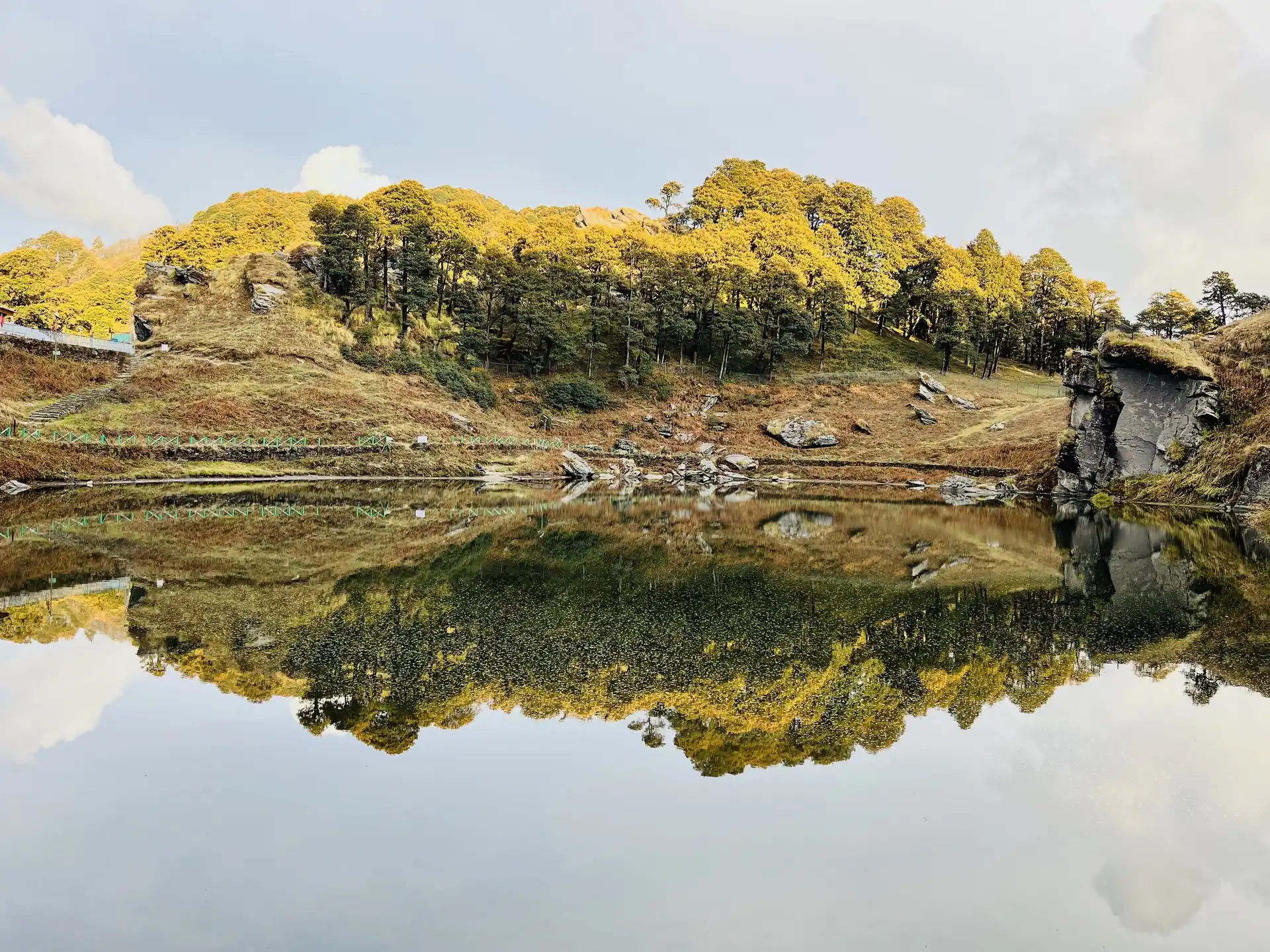 Autumn trees reflected in Serolsar lake