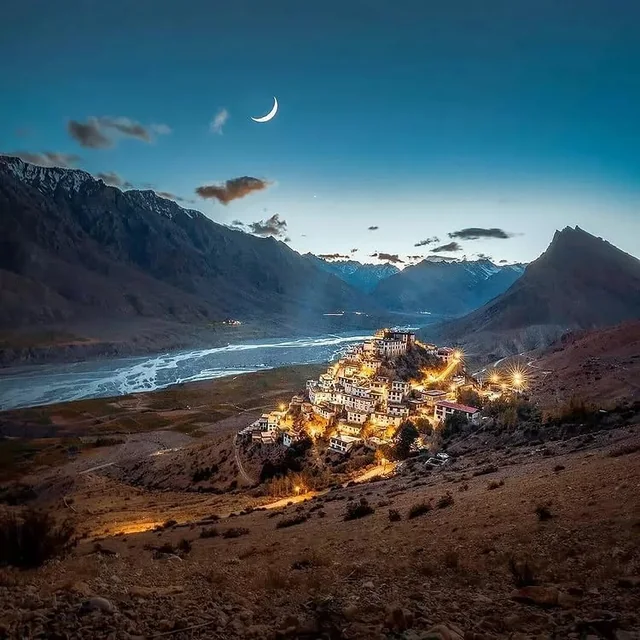 Key monastery lit up at dusk
