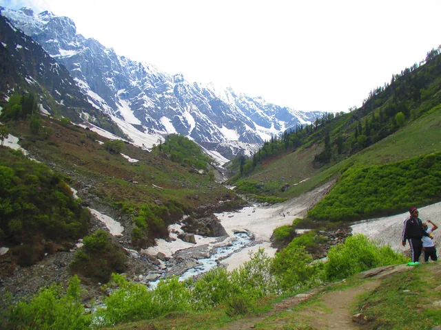A snow bridge over the stream in the Solang valley