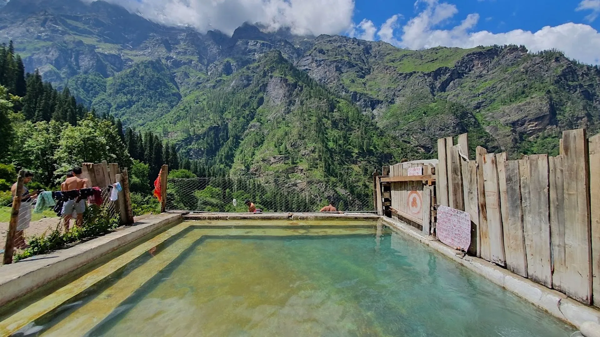 The hot-spring pool at Kheerganga with the valley behind