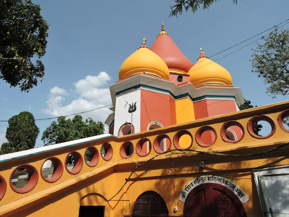 The Shiv temple beside Rani Tal, with golden domes
