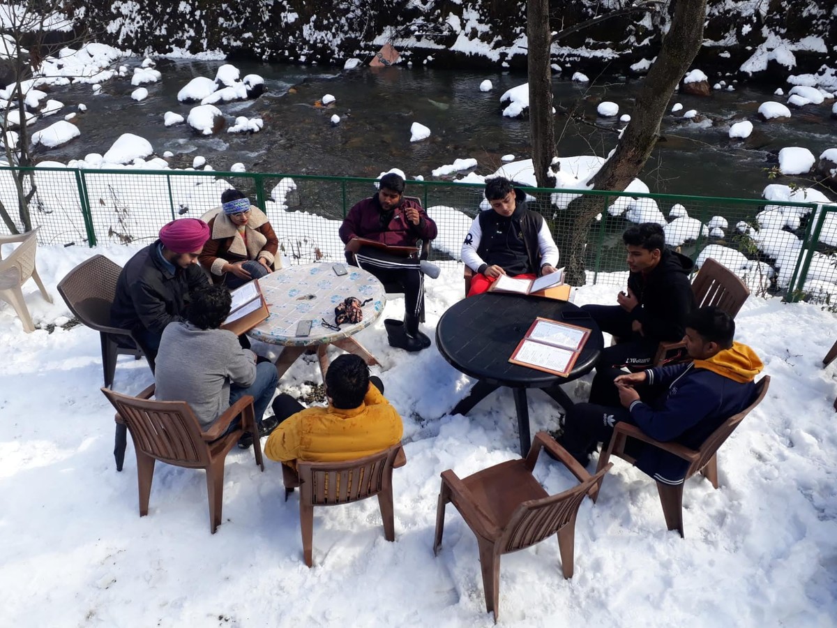 The terrace under snow, by the river