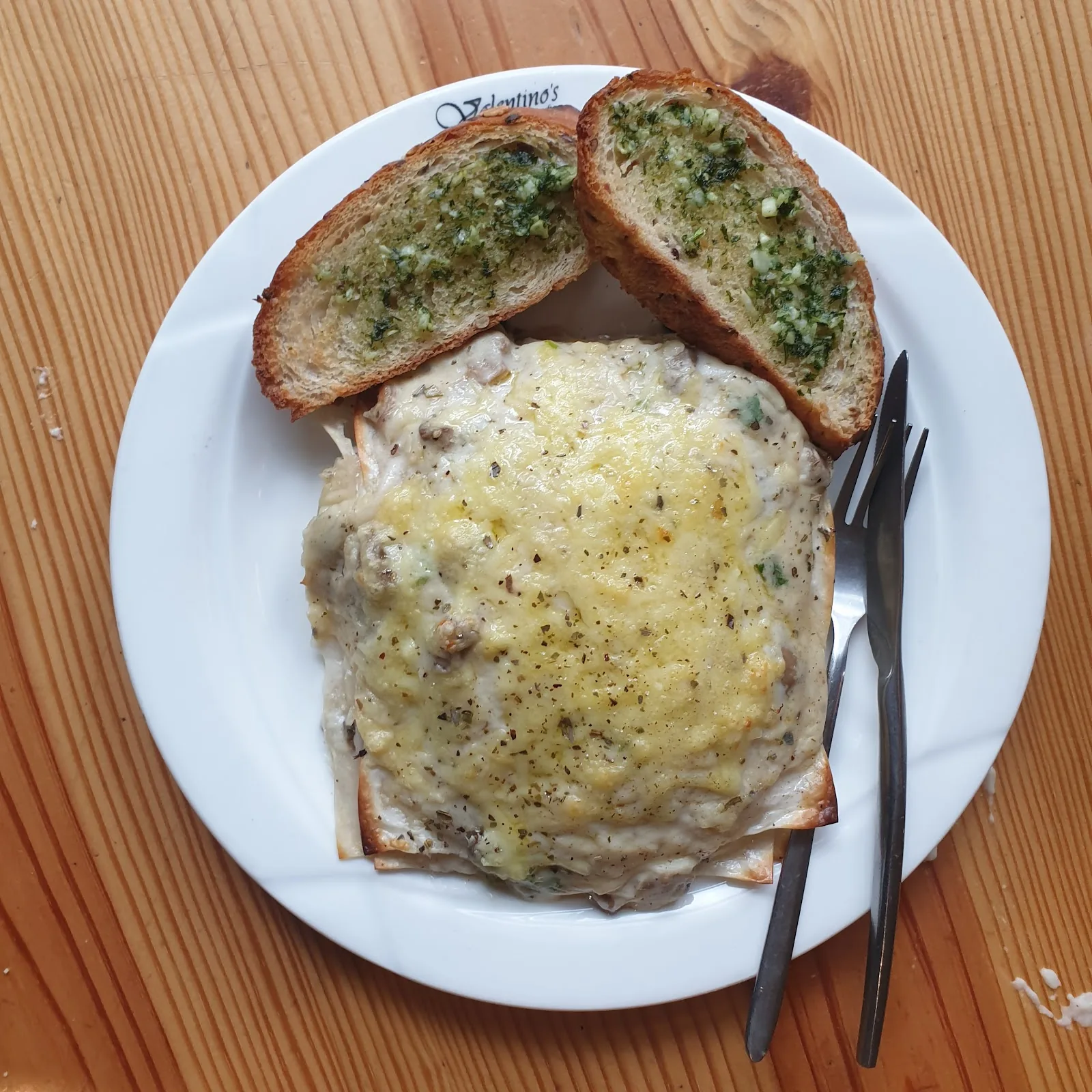 Lasagne served with garlic bread