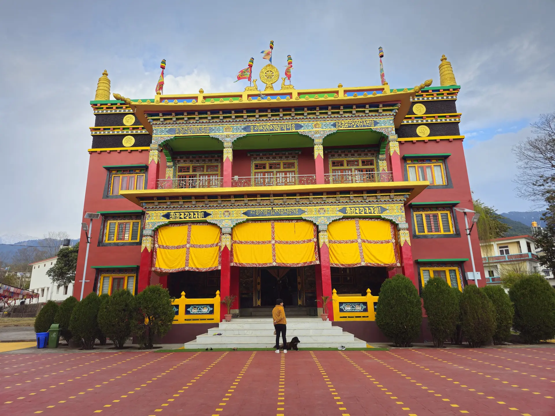 The red and gold front of Chokling Monastery in Bir