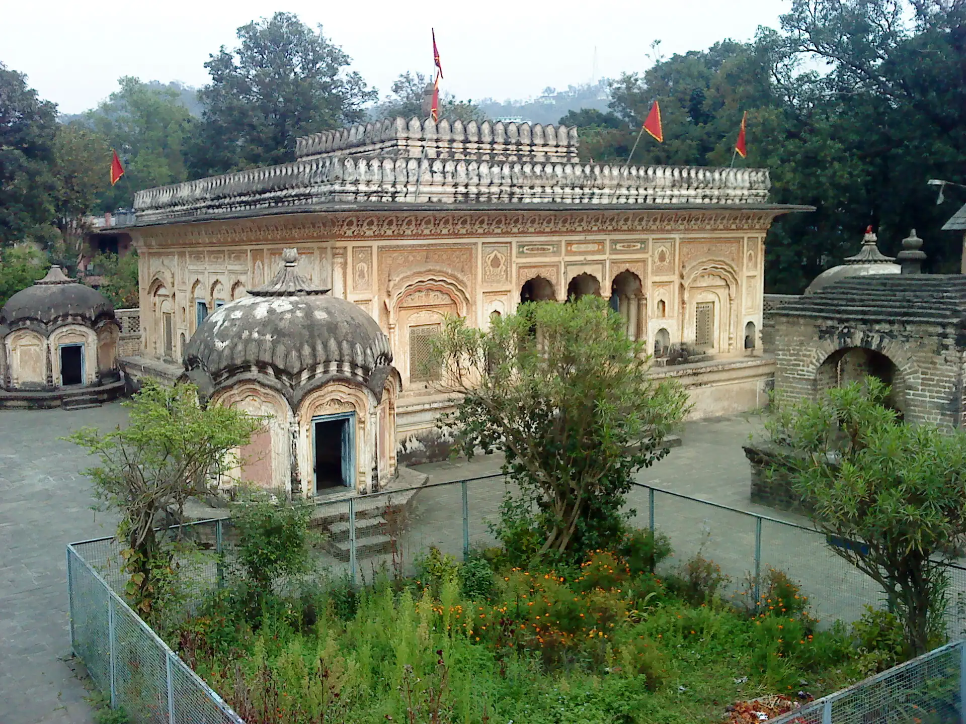 The Narbadeshwar Temple at Sujanpur Tira, a Shiva temple with a decorated parapet and a small dome beside it