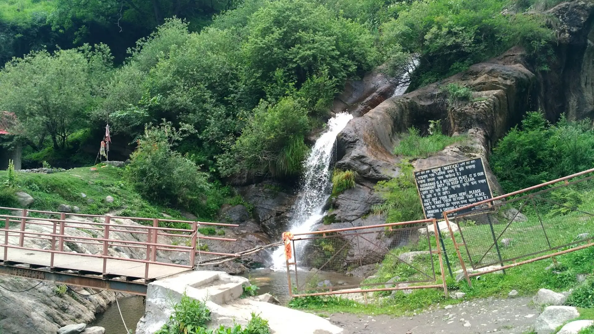 The Rudranag waterfall and the footbridge with the dhaba beside it