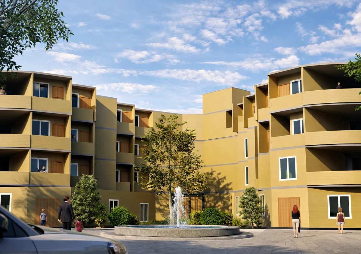 Tribe Den: ochre blocks with curved balconies around a courtyard and fountain